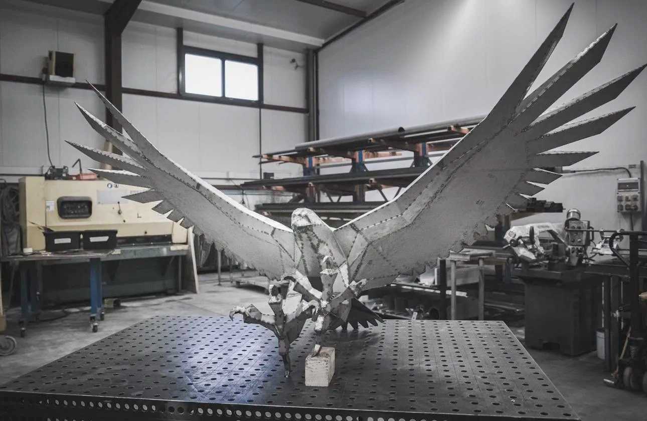 Eagle! Weld it yourself with Digital plan for metal. Set of digital files include: .pdf – scheme, .dxf – CNC cutting.